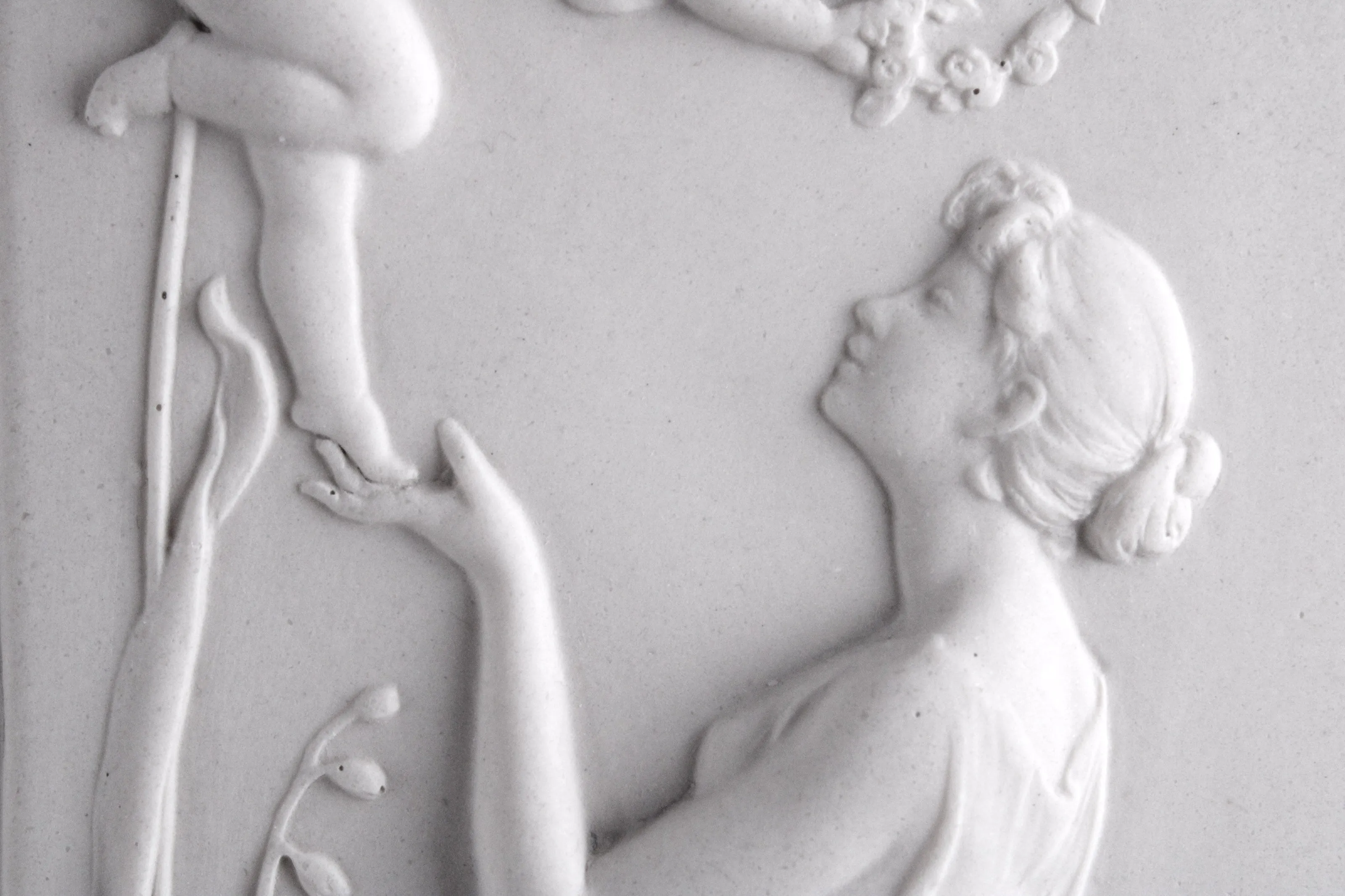 Celestine with Cherub Bas-relief in pair