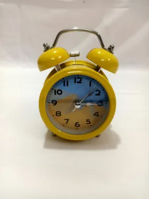 Sri Sainath Enterprises Table Clock/Yello Colour Table Clock with ALARAM/Size:- 4 in Height, 3 in Width.