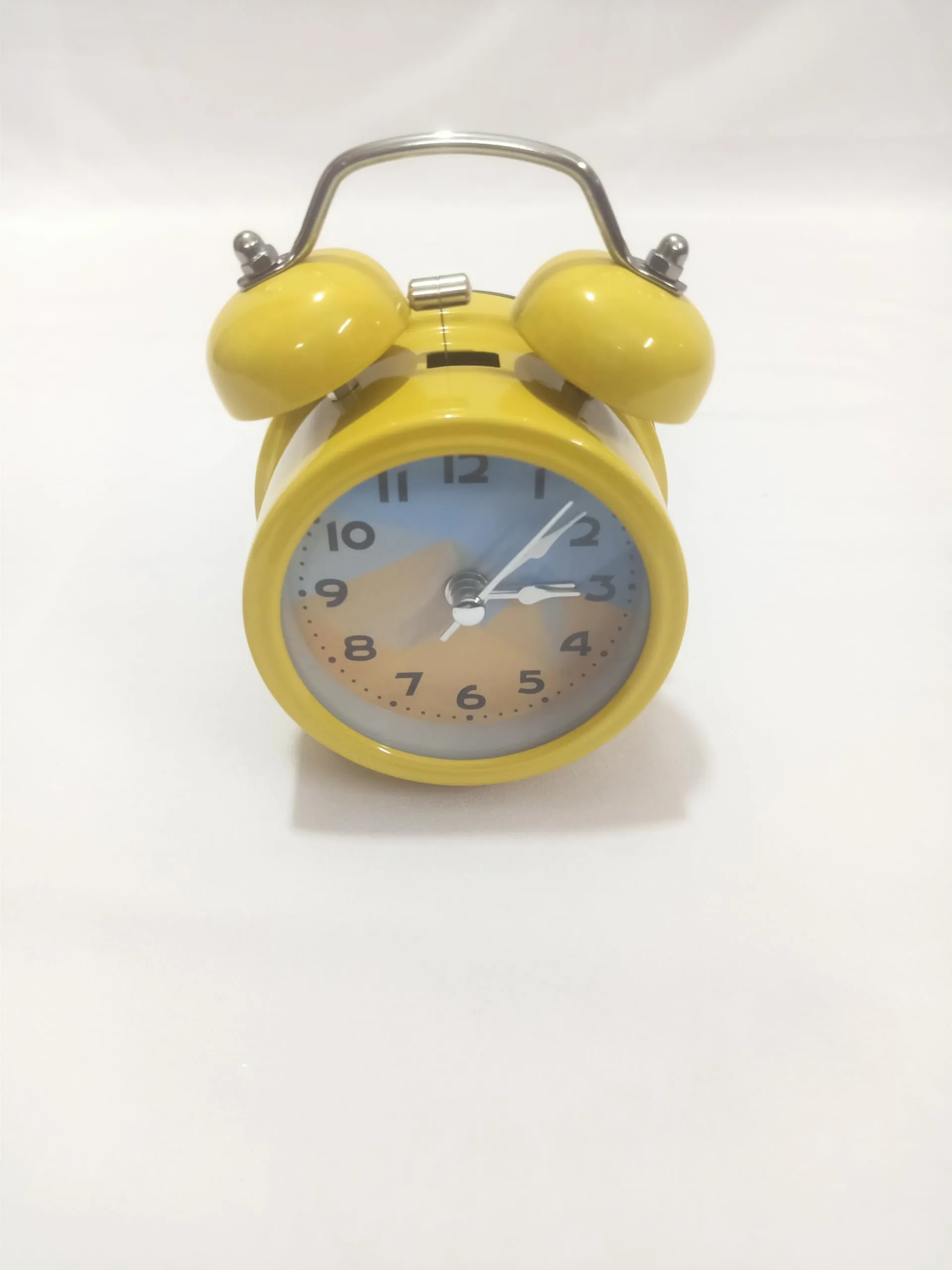 Sri Sainath Enterprises Table Clock/Yello Colour Table Clock with ALARAM/Size:- 4 in Height, 3 in Width.